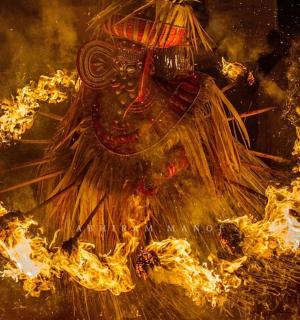 a painting of a man engulfed in fire