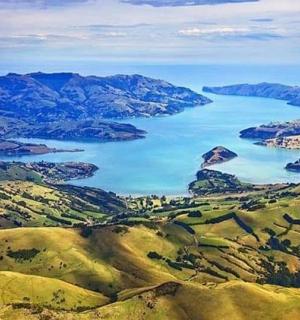 an aerial view of a large lake in a valley