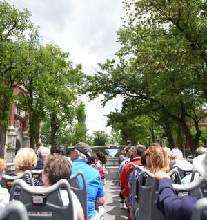 a crowd of people sitting on a bus