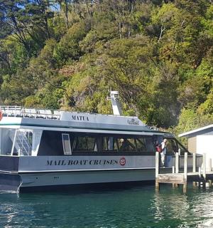 a boat is docked at a dock in the water