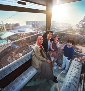 a family standing on top of a building