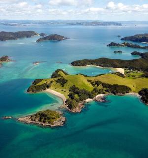 an aerial view of an island in the ocean