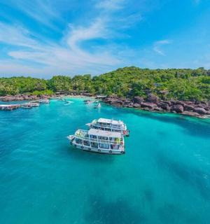 an island with a boat in the water