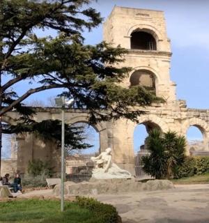 a building with a statue in front of it
