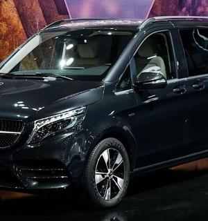 a black car on display at a show