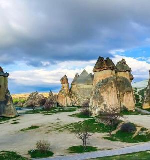 a group of large rocks in a field