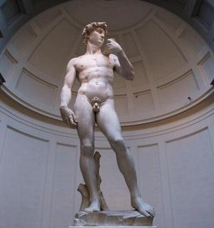 a statue of a man standing in a building