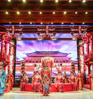 a group of performers on the stage at a show