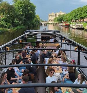 a group of people on a boat on a river