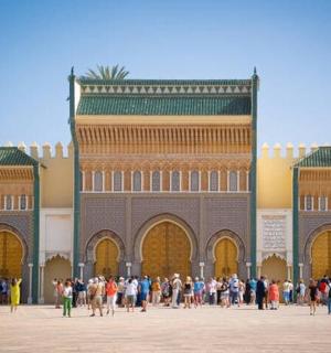 a group of people standing in front of a building