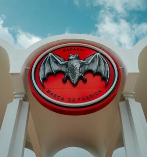 a sign on a building with a bat on it