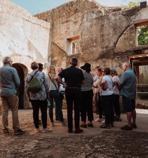 a group of people standing outside of a building
