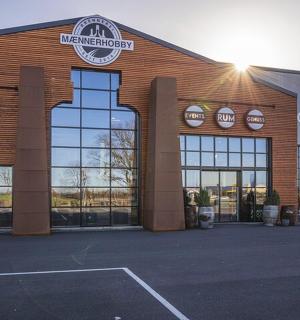 a large brick building with a sign on it