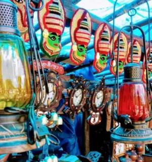a display of colorful glass lamps in a store