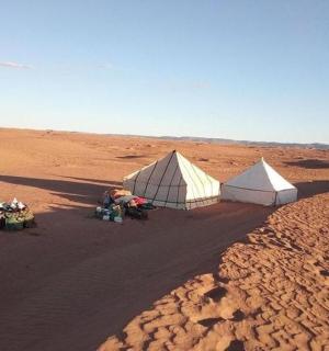 two tents in the middle of a desert