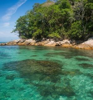 a large body of water next to a beach