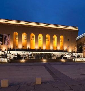 a large building with lights on the front of it