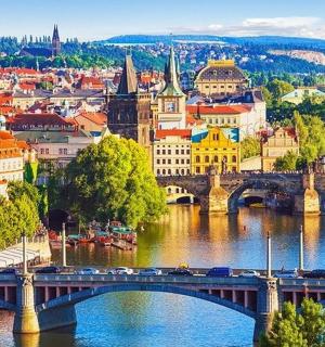 a view of a city with a bridge over a river