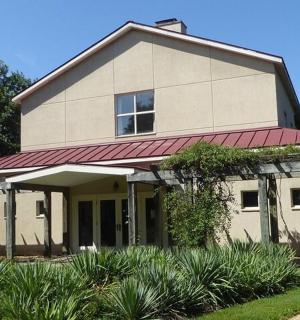 a large house with a red roof