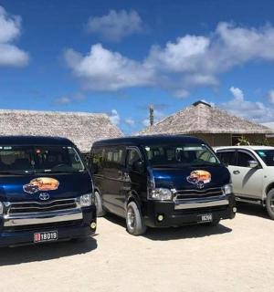a couple of trucks parked in a parking lot