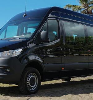 a black van parked on the side of the road