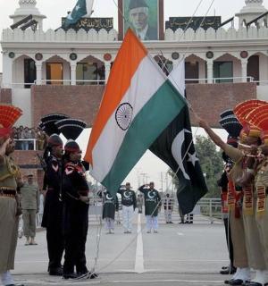 a group of people holding flags in a parade