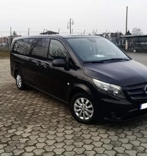 a black van parked in a parking lot