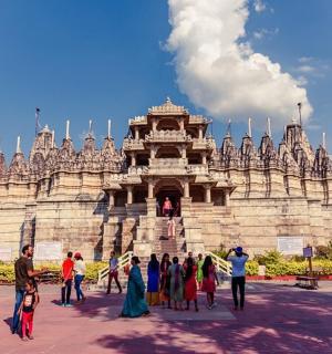 a group of people standing in front of a building
