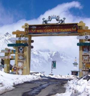a sign on a road in the snow