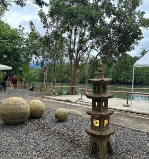 a group of spheres on the ground in a park