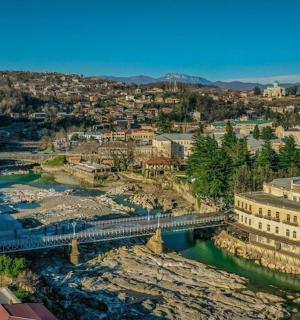an aerial view of a city with a river