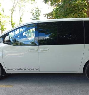 a white van parked in a parking lot