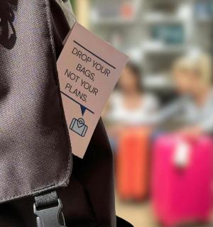 a tag is attached to the back of a jacket