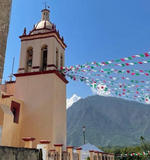 a building with a tower with a bell tower