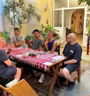 a group of people sitting around a table