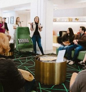 a group of people sitting in a waiting room