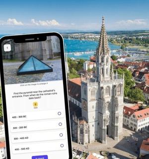 an iphone taking a picture of a church