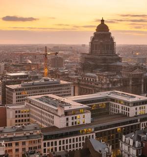 an aerial view of a city with a building
