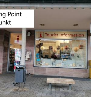 a store front with a sign in front of it