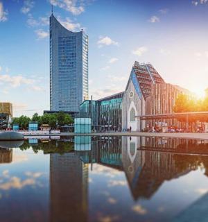 a city with tall buildings and a body of water