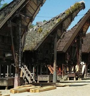 a large wooden building with a roof