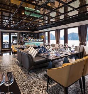 a restaurant with tables and chairs and a bar