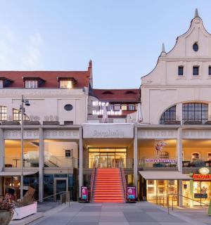 a building with a red staircase in front of it