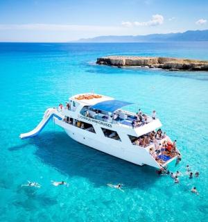 a group of people on a boat in the water