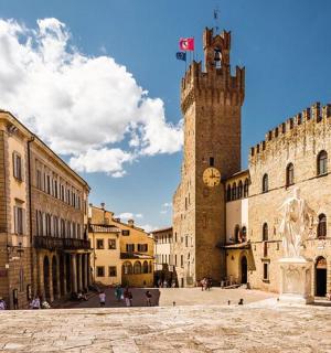 a group of buildings with a clock tower
