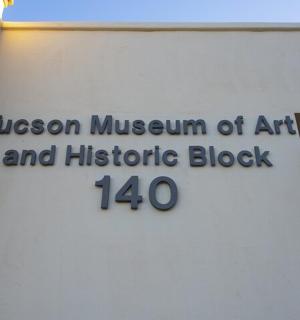 a sign for the museum of art and rhetoric block