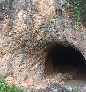 a cave in the side of a cliff