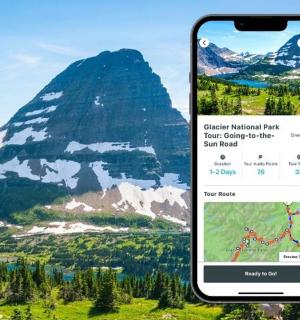 two cell phones with a view of a mountain