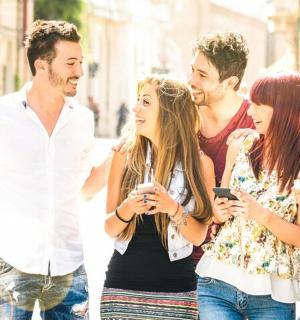 a group of people walking down the street