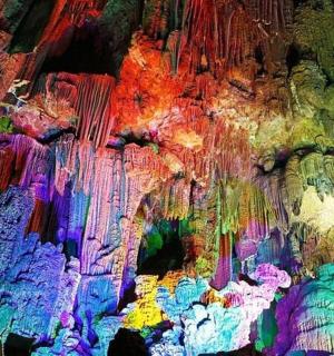 a painting of a cave with colorful paint